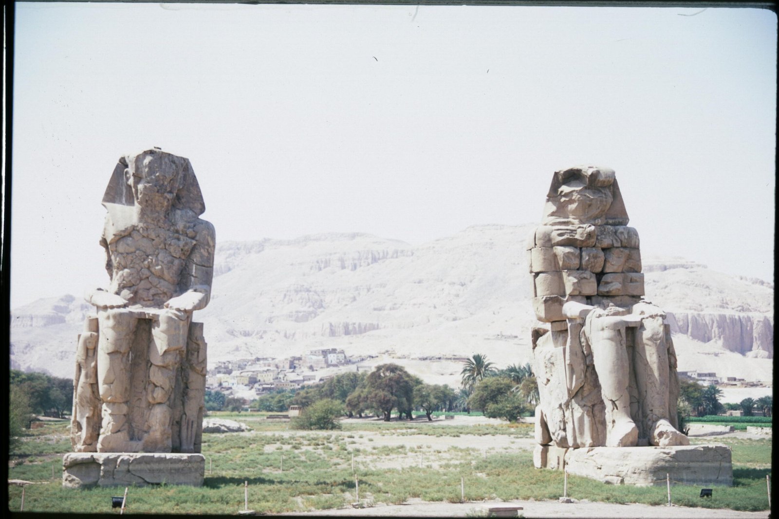 Marvel at the Colossi of Memnon, two gigantic stone statues that have stood for over 3,400 years.
